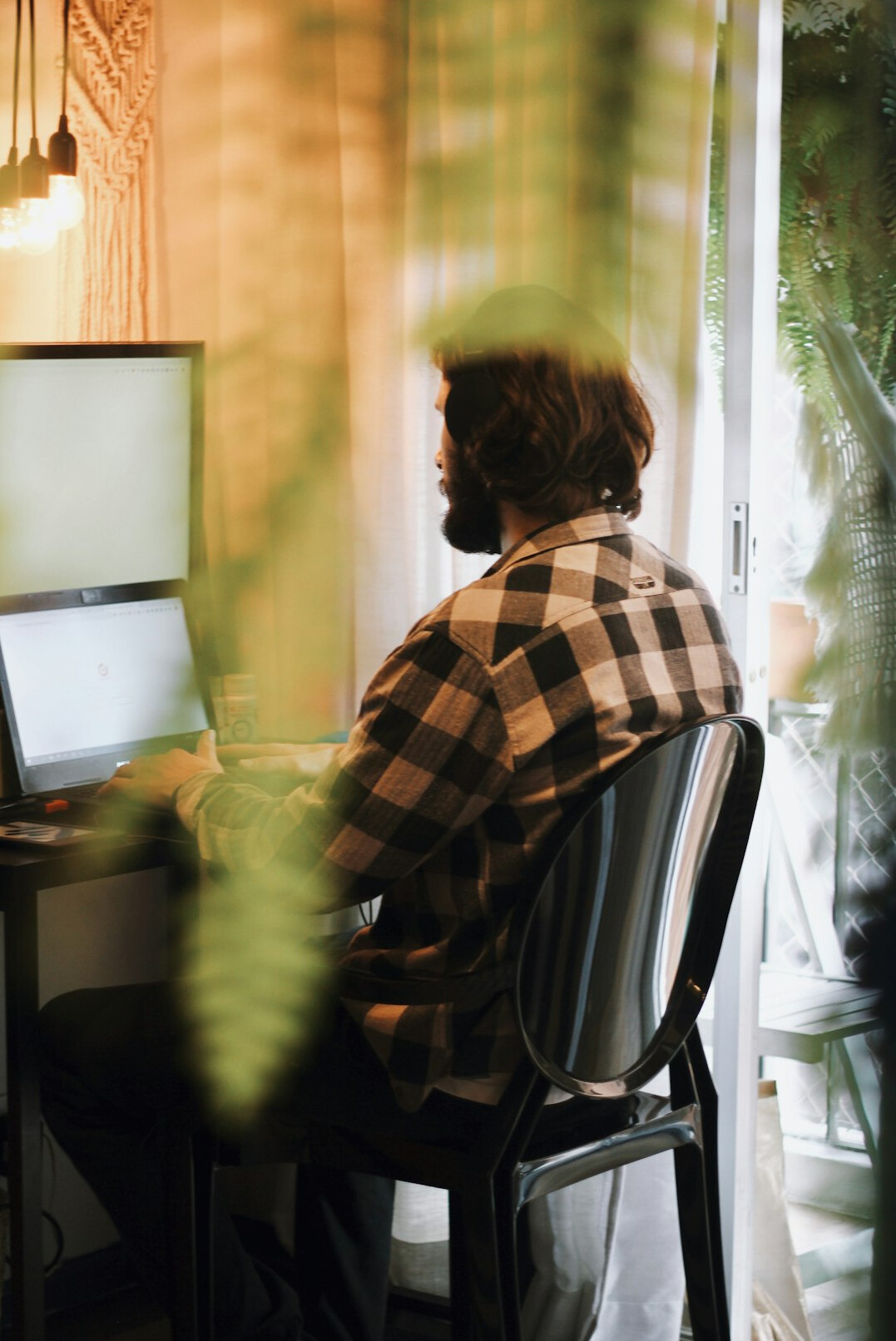 person coding at home