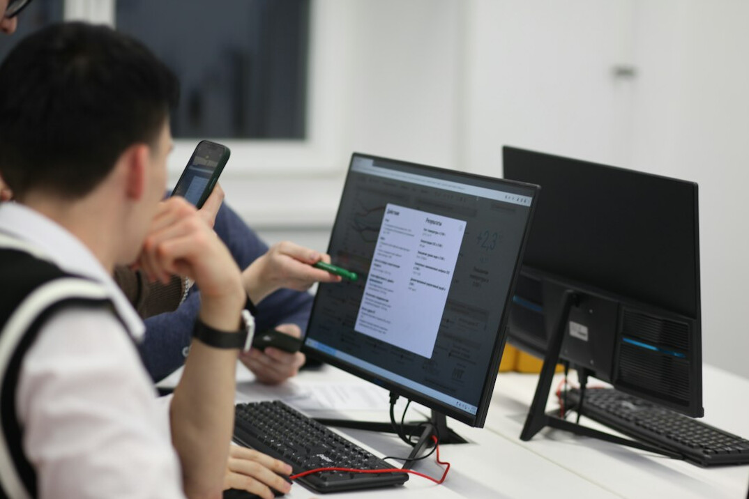 student working on coding project